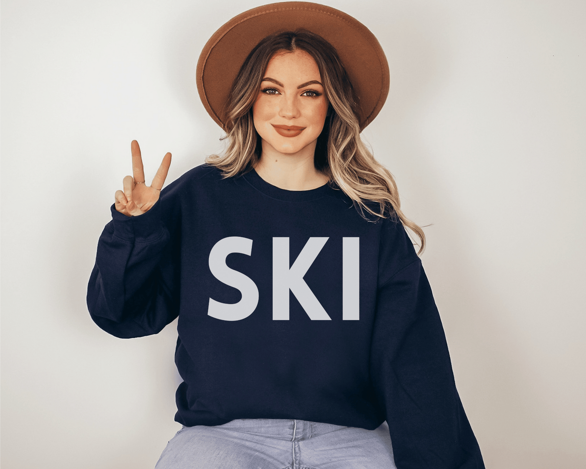 Ski Sweatshirt in Navy on a female model.